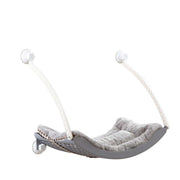 Hanging cat hammock for pets, made of plastic with gray cushion, designed for sunbathing and relaxation.